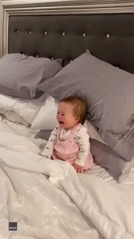 Baby With Down Syndrome Cannot Stop Giggling at Her Father