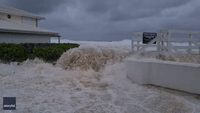 Huge Wave Flows Into Pool as Hurricane Ian Approaches Cayman Islands