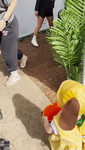 Twin Toddlers Go Trick-or-Treating in Slinky Dog Costume