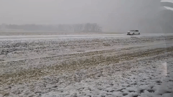 Motorists Face Icy Conditions as Large Hail Stones Fall on I-29 Near Colman