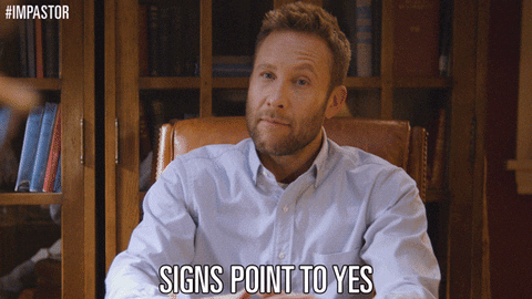 TV gif. Michael Rosenbaum as Buddy Dobbs in Impastor leans forward in a desk saying, "Signs point to us."