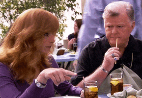 TV gif. Lisa Kudrow as Valerie Cherish and Robert Michael Morris as Mickey Deane in The Comeback sit together at a restaurant outside. They both nod and point towards another person across the table. With a serious expression, Mickey says, “True dat.” 