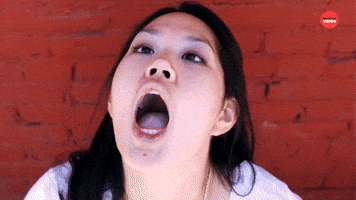 Slow Motion: People Catch Popcorn In Their Mouths