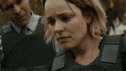 TV gif. Rachel McAdams as Ani Bezzerides wears a bulletproof vest. She nods with a serious, almost worried expression on her face, and quietly says, “Yep.” A man looks at her critically and then steps away from her.