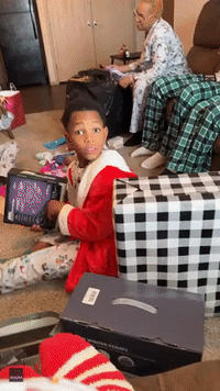 Boy Has Powerful Reaction When Opening Dream Present on Christmas Day