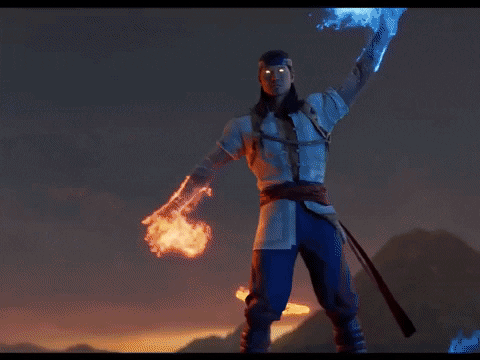 Video game gif. Liu Kang from "Mortal Kombat 1" swoops his hands out in a circle, one hand with blue flames and the other with orange flames. He brings his hands back together and holds a glowing orange fire at his chest. A flaming Mortal Kombat insignia appears behind him as the mountain landscape behind him fades into gray fog.
