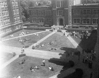 black and white running GIF by Loyola University New Orleans, Monroe Library, Special Collections & Archives