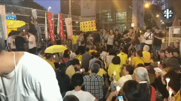 Supporters of Sentenced Umbrella Movement Leaders Gather Outside Detention Centre
