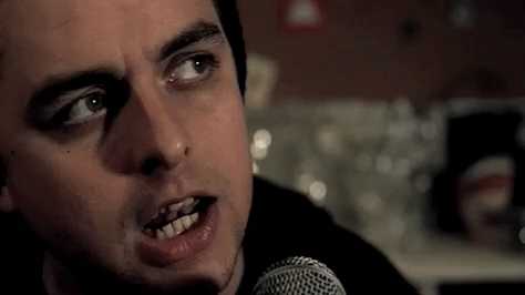 warning GIF by Green Day