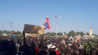 Protesters in Ouagadougou Wave American Flag