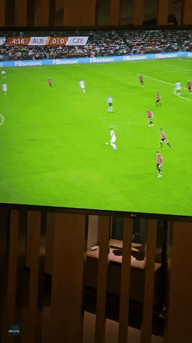 Soccer Fan Watches Euro 2024 Qualifier From Comfort of Hotel Room