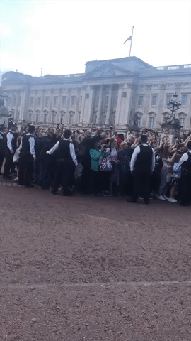 Well-Wishers Greet King and Queen Consort at Buckingham Palace