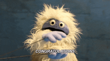 Video gif. A yeti puppet claps his hands. Text, “Congratulations.”