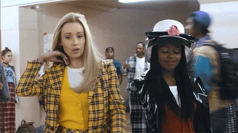 Gif of Iggy Azalea flipping her hair in 'Fancy' video