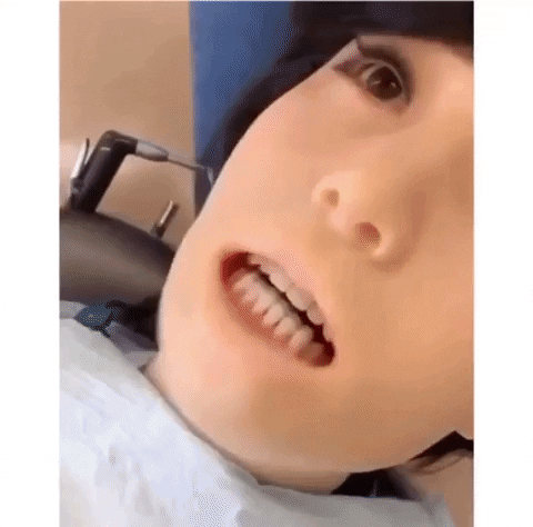96batman giphygifmaker scary robot dentist GIF