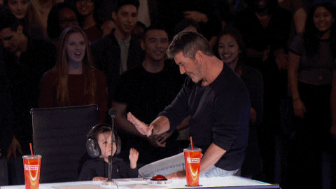 high five simon cowell GIF by America's Got Talent