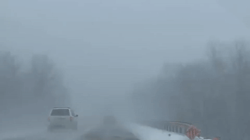 Blowing Snow Reduces Visibility on Freeway in South Illinois