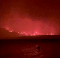 Hellish Scene as 'Out of Control' Fire Nears Lakeside in British Columbia