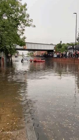 London Fire Brigade Rescues Five People From Car Trapped in Floodwater