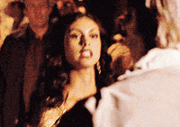 TV gif. Looking angry, Morena Baccarin as Inara from Firefly slaps a man across the face.
