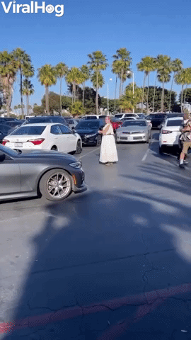 Woman Tries to Lay Claim to Parking Spot