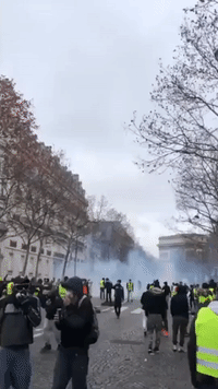 Smoke Clouds Streets During Clashes Between Police and Yellow Vest Demonstrators