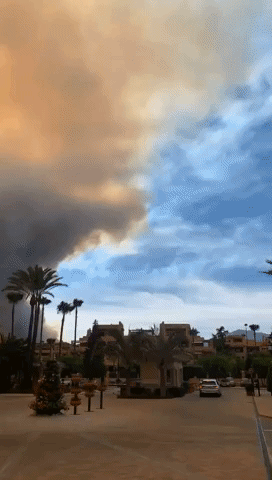 Ash Cloud From Forest Fire Looms Over Resort on Spain's Costa Del Sol
