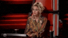 Reality TV gif. Miley Cyrus as a judge on The Voice. She leans back in her seat and looks eager as she smiles and says, "Yes!" while clapping her hands.