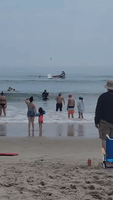 Small Plane Crashes Into Surf at New Hampshire's Hampton Beach