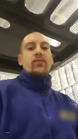 On a Roll: Dutch Warehouse Worker Laughs With Glee as He Shows Off Toilet Paper Abundance