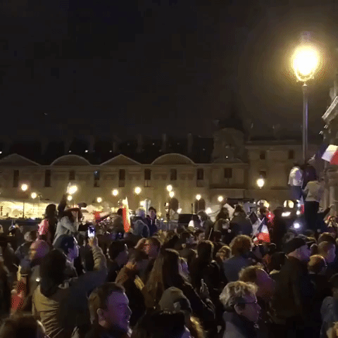 Crowds Celebrate Macron Presidential Victory at Louvre