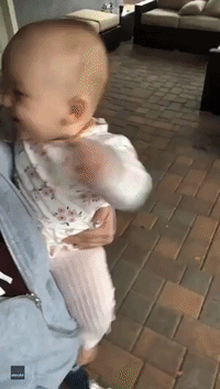 Fascinated Baby Sees Rain for the First Time