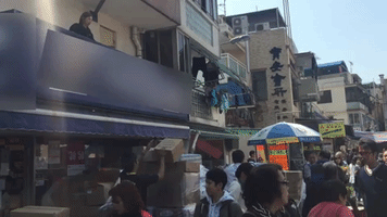 Hong Kong Supermarket Staff Move Boxes with Kung Fu Flair