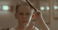 home alone kid GIF