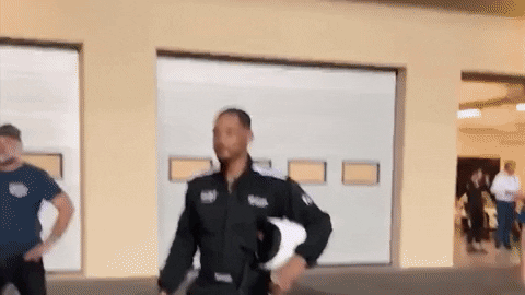 Celebrity gif. We zoom in on a shocked Will Smith who stands stunned, looking confused.