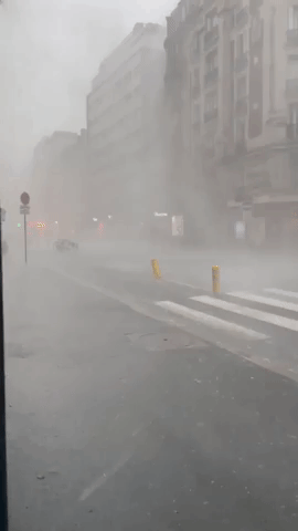 Torrential Rain Lashes Paris Following Heatwave