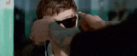 babydrivermovie sunglasses ansel elgort baby driver taking off GIF