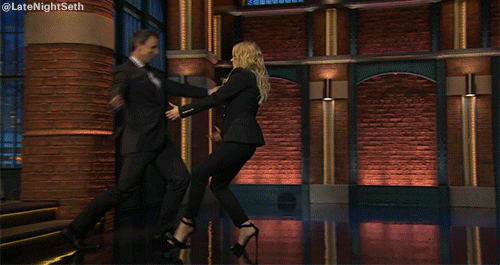 kate mckinnon hug GIF by Late Night with Seth Meyers