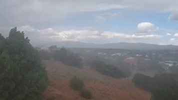 'Little Monsoon Cell' Pours Rain Amid Blue Sky, Record Heat in New Mexico