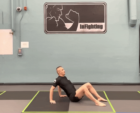 ritchieyip giphygifmaker kickboxing warm up shoulder stretch GIF