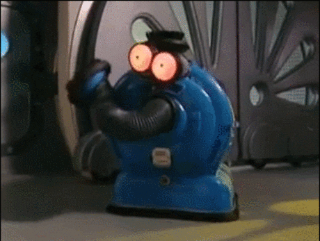 Stop motion gif. Noo-Noo the Vacuum Cleaner, eyes wide in a dazed stupor.