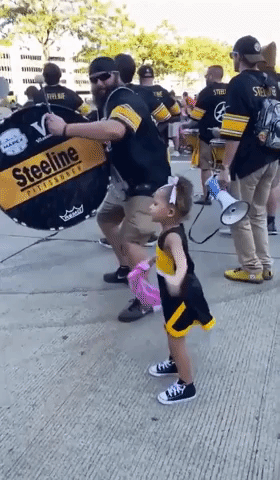 Tiny Football Fan Dances Her Socks Off