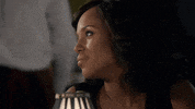 TV gif. Kerry Washington as Olivia on Scandal smiles curtly to the side, then faces forward and leans back in her chair, looking deeply annoyed.