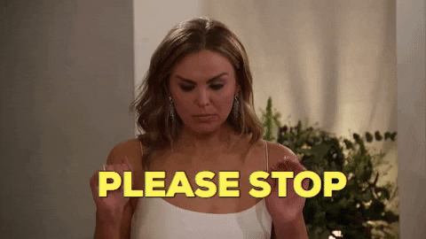 Reality TV gif. Bachelorette Hannah Brown raises her hands in exasperation and adamantly says, "Please stop."