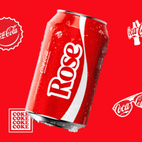 Sponsored gif. A red can of Coca-Cola with the name "Rose" slides in from the left, pauses, and slides to the right offscreen. Coca-Cola logos on bottle caps and sunglasses are in the background.