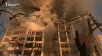 Kyiv Fire Crews Tackle Blaze in Apartment Block Following Russian Strike
