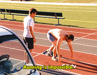 Parks and Recreation gif. Chris Pratt as Andy, shirtless, goes from a start position to lying facedown on a running track while Rob Lowe as Chris stands by and looks on. Text, "Running is impossible."