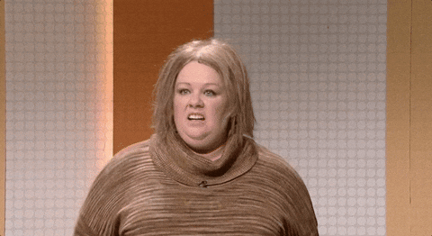 SNL gif. Melissa McCarthy as a game show contestant looks disheveled as she sighs in distress and says, "Yep."