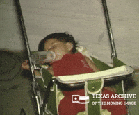 Tired Baby GIF by Texas Archive of the Moving Image
