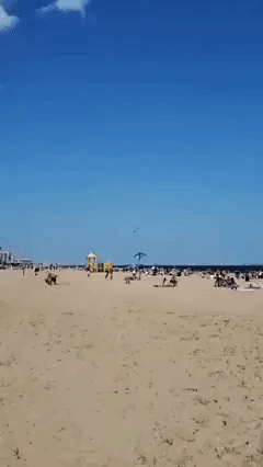Beachgoers Flock to Coney Island Ahead of Holiday Weekend